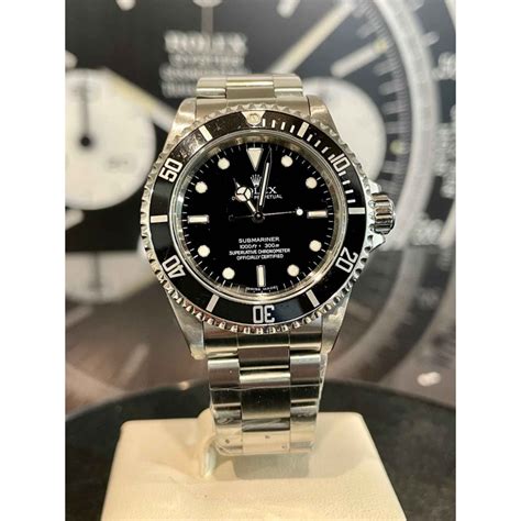 rolex submariner 14060m 4 line.